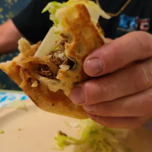 a man eating a sandwich