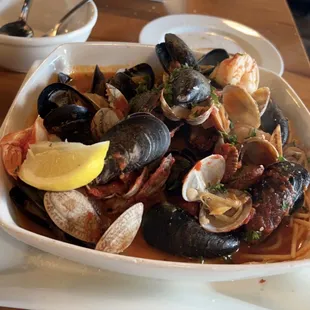 "Spaghetti frutta di mare with spicy fra diavolo sauce." It was not spicy and sauce was a full bowl of "broth"