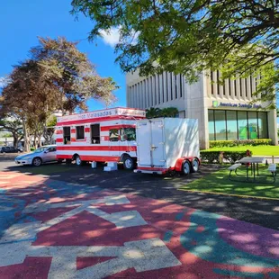 a food truck parked in front of a building
