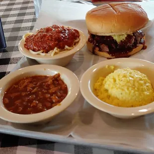 Jumbo BBQ plate with beans and slaw and side of spaghetti