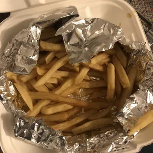 french fries in a styrofoam container