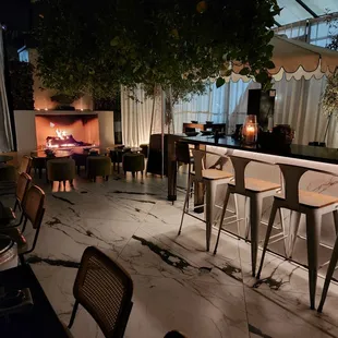 Outside dining by fireplace