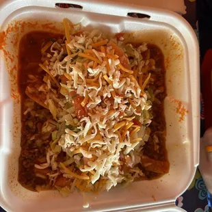 Frito pie with red chili