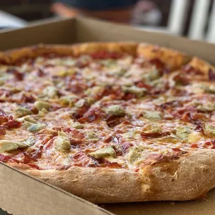 This was a large pizza with capicola, artichokes and roasted red peppers. We haven&apos;t had such a good pizza in a long time.