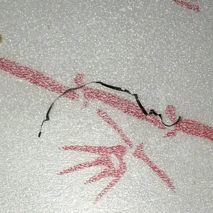 A piece of metal found in my daughter's Thai rice!