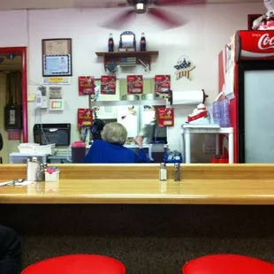 a man sitting at the counter