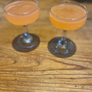 two cocktails on a table