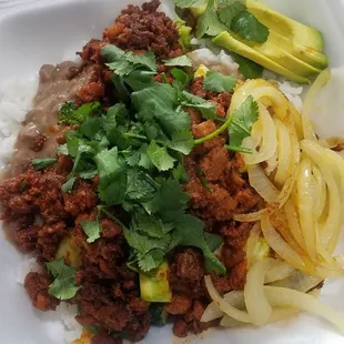 Al pastor customized bowl with avocado, rice, beans, grilled onions/broccoli/zucchini