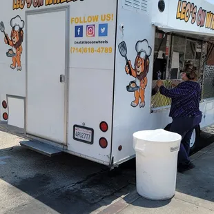 a food truck parked in front of a building
