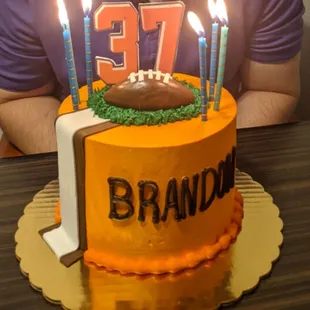 Their creation! I SUPER LOVED IT... numbers=made of icing, so defined &amp; looks faaaantastic. Football is chocolate, team colors spot on!
