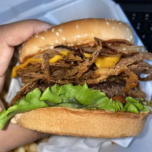 Cheeseburger Special with grilled onions and added onion straws