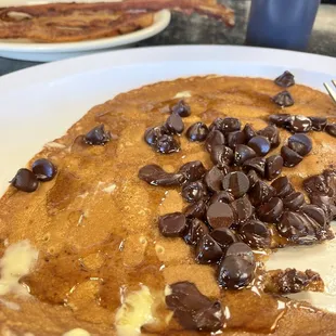 Chocolate chip pancake and bacon