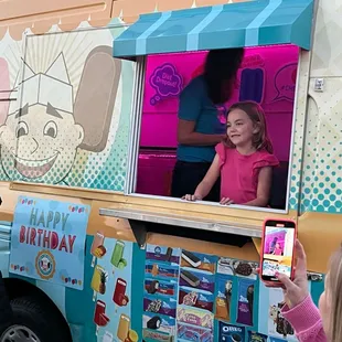 My niece handing out amazing ice cream to her friends and the neighborhood