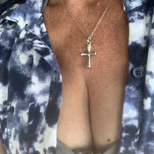 The necklace he fixed for me. My mother's ashes are inside the cross