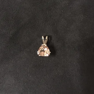8mm Trillion Cut Morganite stone in a White Gold pendant setting.  Took them both to Leo, quoted me $40 and pick up the next day, Thanks Leo