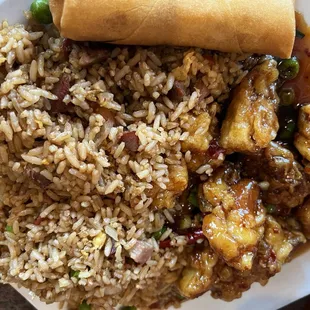 General chicken, veggie egg roll and fried rice.