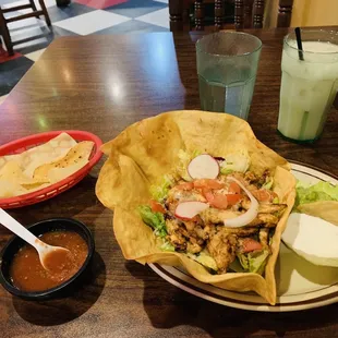 My complimentary chips and salsa, and my main orders of Leo&apos;s yummy taco salad (with chicken) and my refreshing Horchata :) !