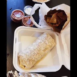 Beans, Chips and 8 oz, Salsa, California Burrito, and Sausage Breakfast burrito.