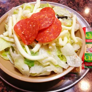 Special salad with provel cheese, pepperoni, olives, and AnneMarie's dressing.
