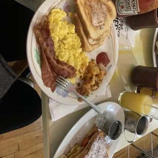 2 Scrambled eggs, bacon, potatoes, white toast &amp; strawberry stuffed French toast