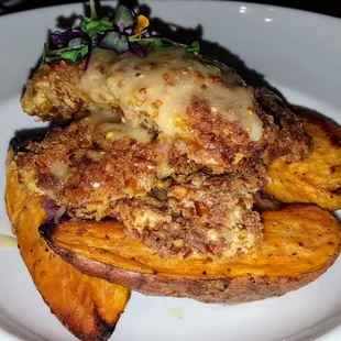 Pretzel crusted walleye topped with a mustard sauce. Roasted sweet potatoes, braised red cabbage.
