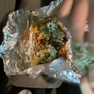 Al-pastor tacos with pineapple are chef&apos;s kiss. Please excuse the hands in the picture, we couldn&apos;t hold back