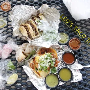 Click picture and zoom in on  tacos al pastor.