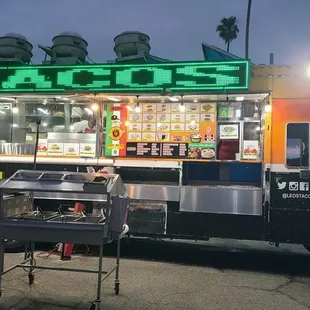 Taco Truck &amp; Condiments Bar infront of it  06-08-2024
