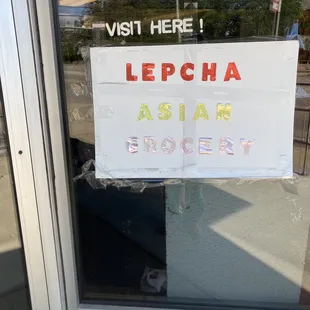 a sign in the window