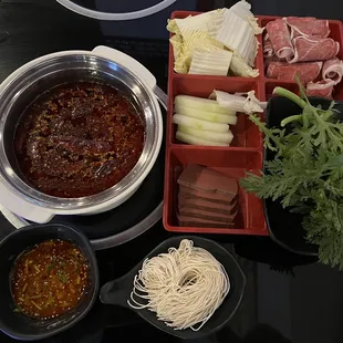 Mala soup, Napa cabbage, winter melon, daisy crown, lamb, duck blood, thin noodles