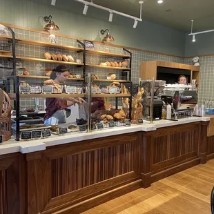 a woman behind the counter