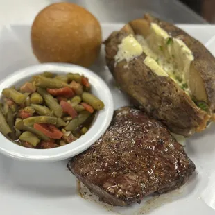 Friday special : steak night with baked potato, green beans and a roll of