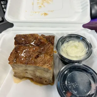 Bread  pudding with fresh whipped cream and berries