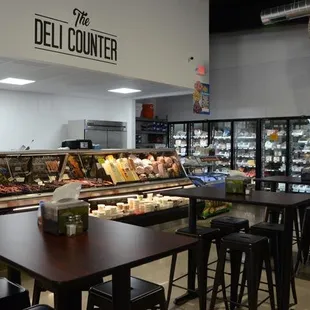 a deli counter with a variety of meats