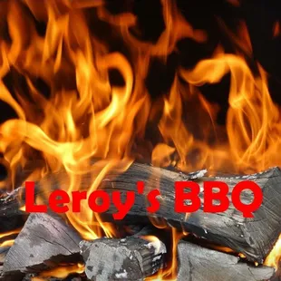 a photo of a fire with the words leroy's bbq on it