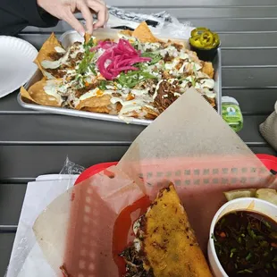 Brisket Quesabirria taco, Brisket Nachos... dear Lord they were both SO tasty!!!!!! Worth the drive