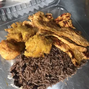 Lerso's Chicken Plate served with Congri rice and black beans and Fried green plantains !
