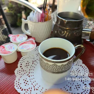 a cup of coffee on a table