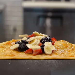 a pastry topped with fruit