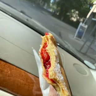 Lemon, sugar, butter crepe with raspberries and lemon curd