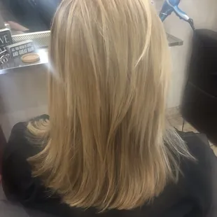 Went from brown long hair to a pretty beige blonde with highlights