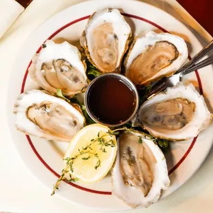 Oysters on the Half Shell* East Coast oysters with house cucumber-garlic mignonette, by the half-dozen or dozen. * Availability varies with
