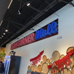 a wall of wicker baskets
