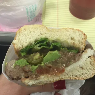 Torta- queso fresco, beans, avocado, jalapeño, lettuce and tomato