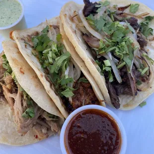Left to right... Carnitas, Pastor, Carne Asada. The green sauce good but different and the red sauce was spicy and amazing.