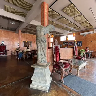 a statue of a woman holding a baby