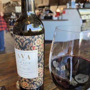 Custom charcuterie board to-go with brie, soft goat cheese, salami, and Spanish chorizo