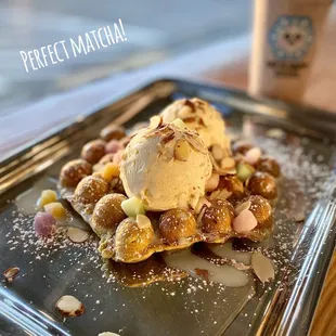 a dessert with ice cream and nuts