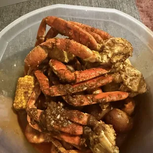 Three crab leg clusters, one and a half pound of shrimp. Corn and potatoes. Let&apos;s crab sauce medium .