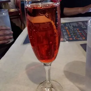Champagne and cherry liquor
